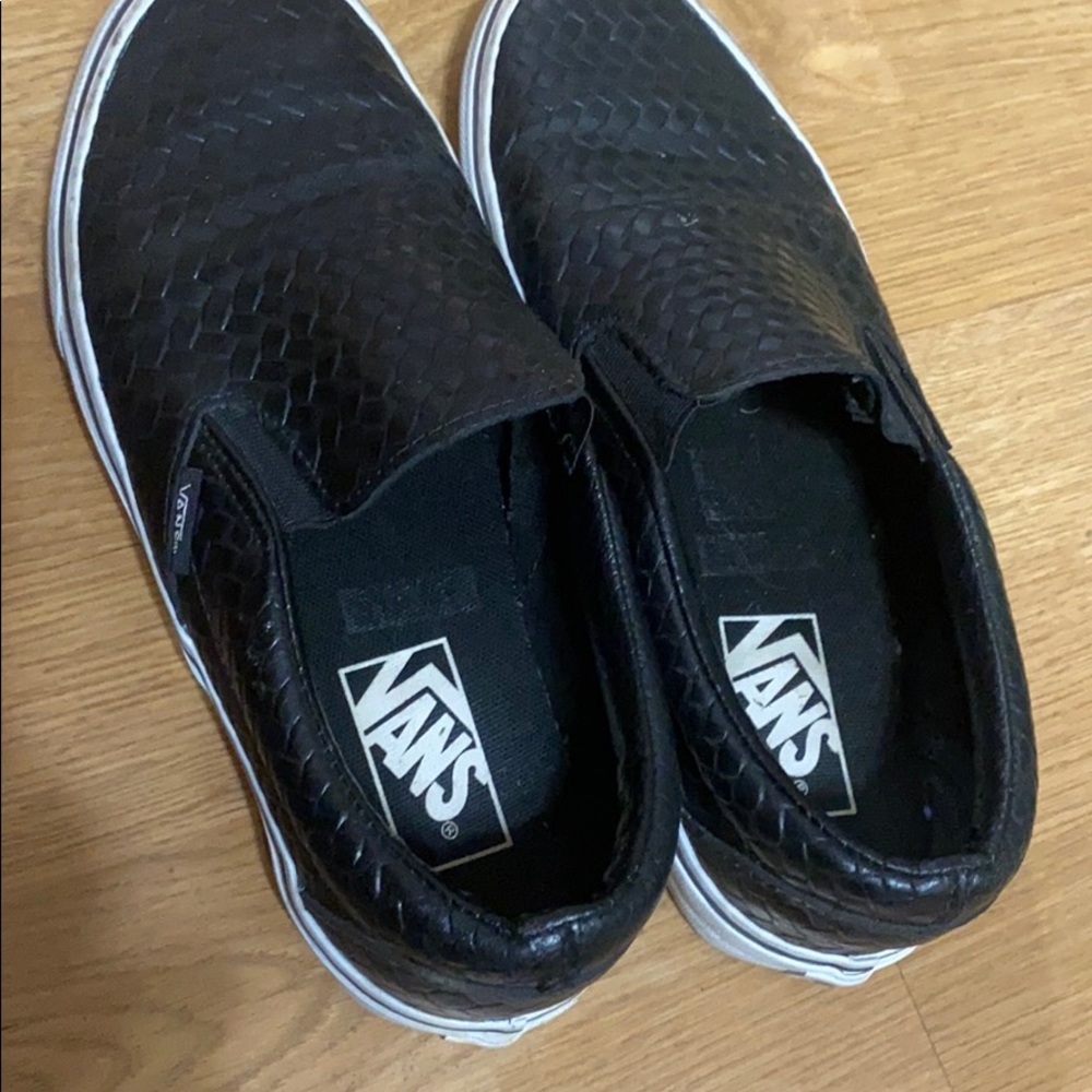 worn Vans slip ons